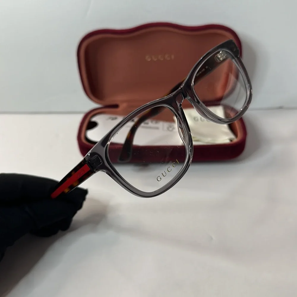 New- Auth - Gucci's GG0004ON soft lines across frames front.Iconic web effect…
